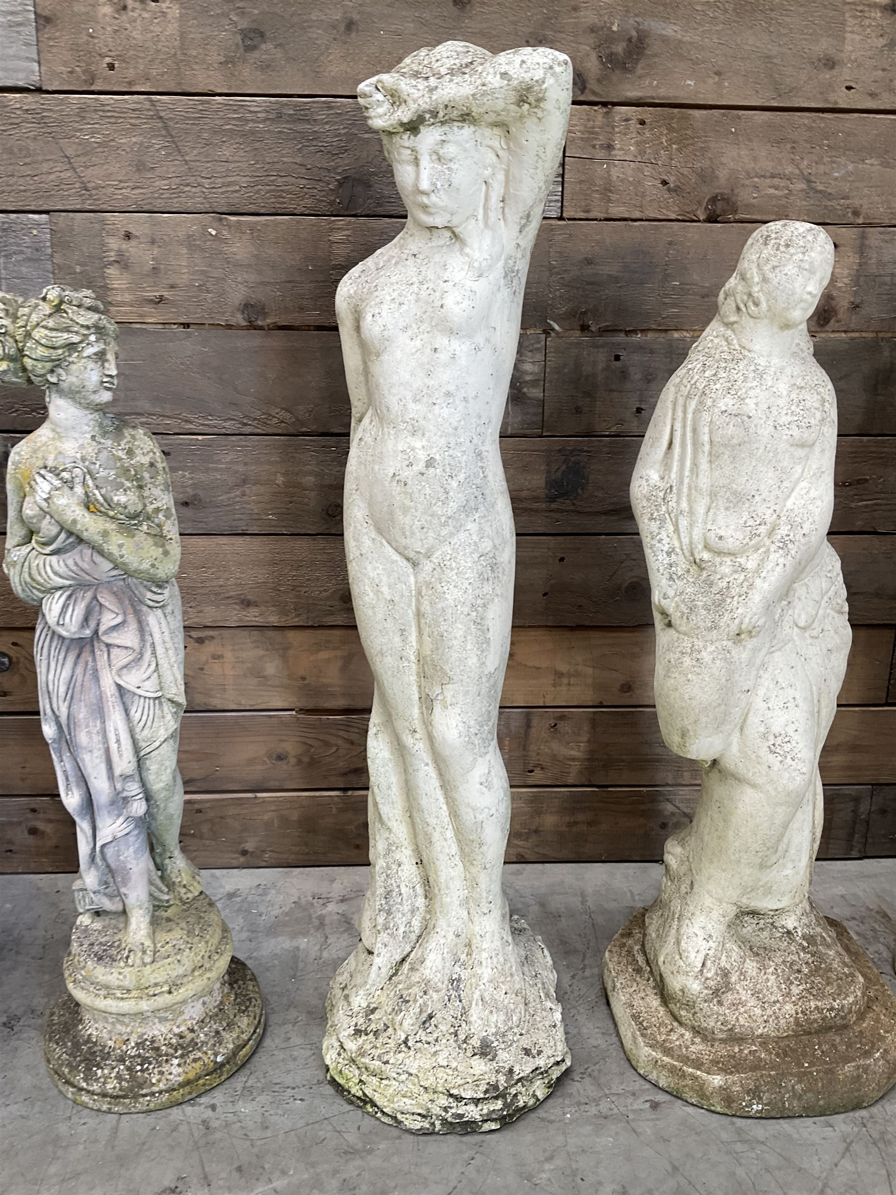 Four cast stone maiden figures, small bird bath and planter