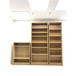 Three light oak finish open bookcases 