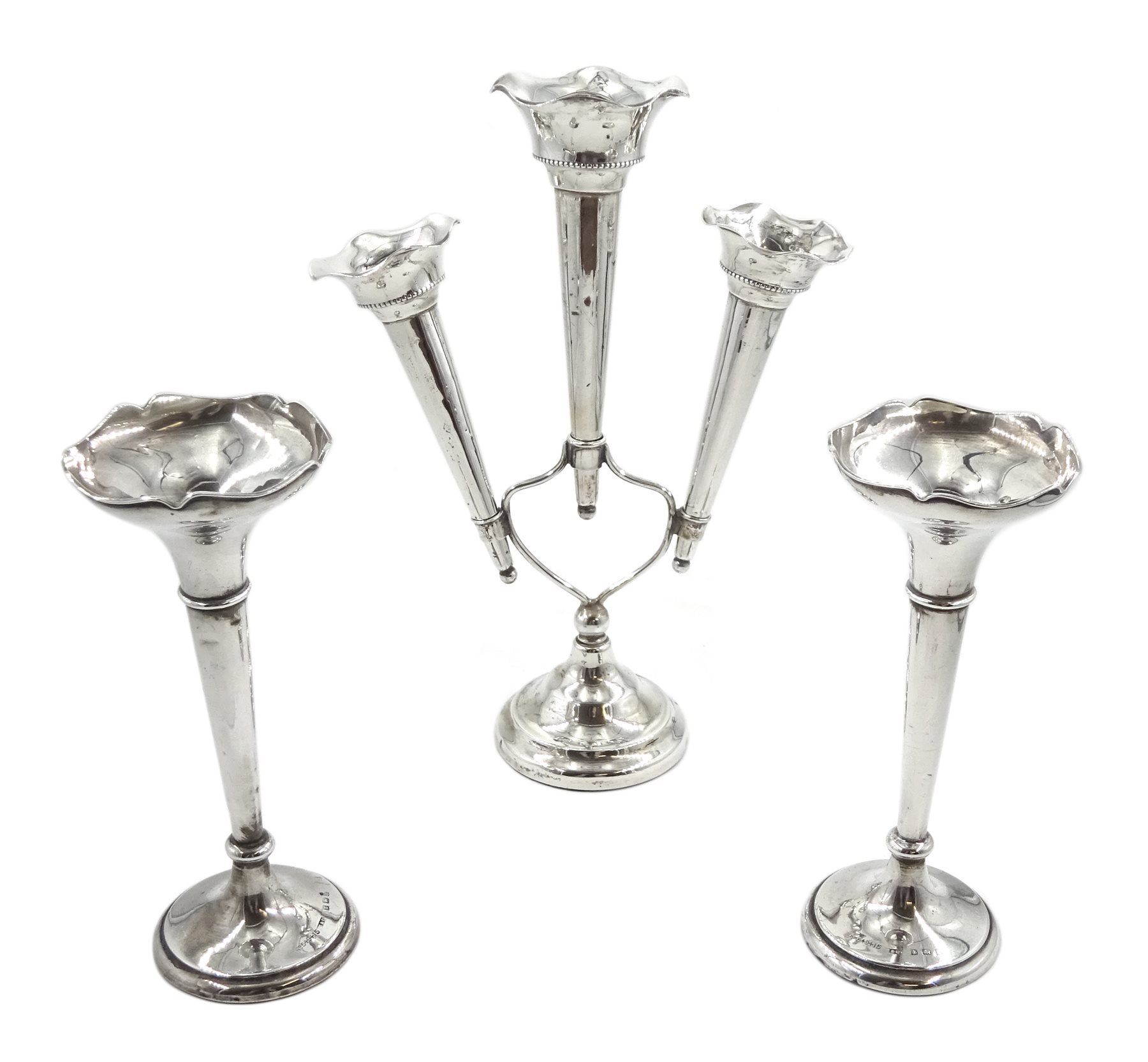 Edwardian silver three branch epergne by Cohen & Charles, Birmingham 1909 and two other silver specimen vases by Sydney & Co, Birmingham 1915