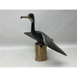 Wooden sculpture of Cormorant aquatic bird on a naturalistic wooden plinth, H46cm