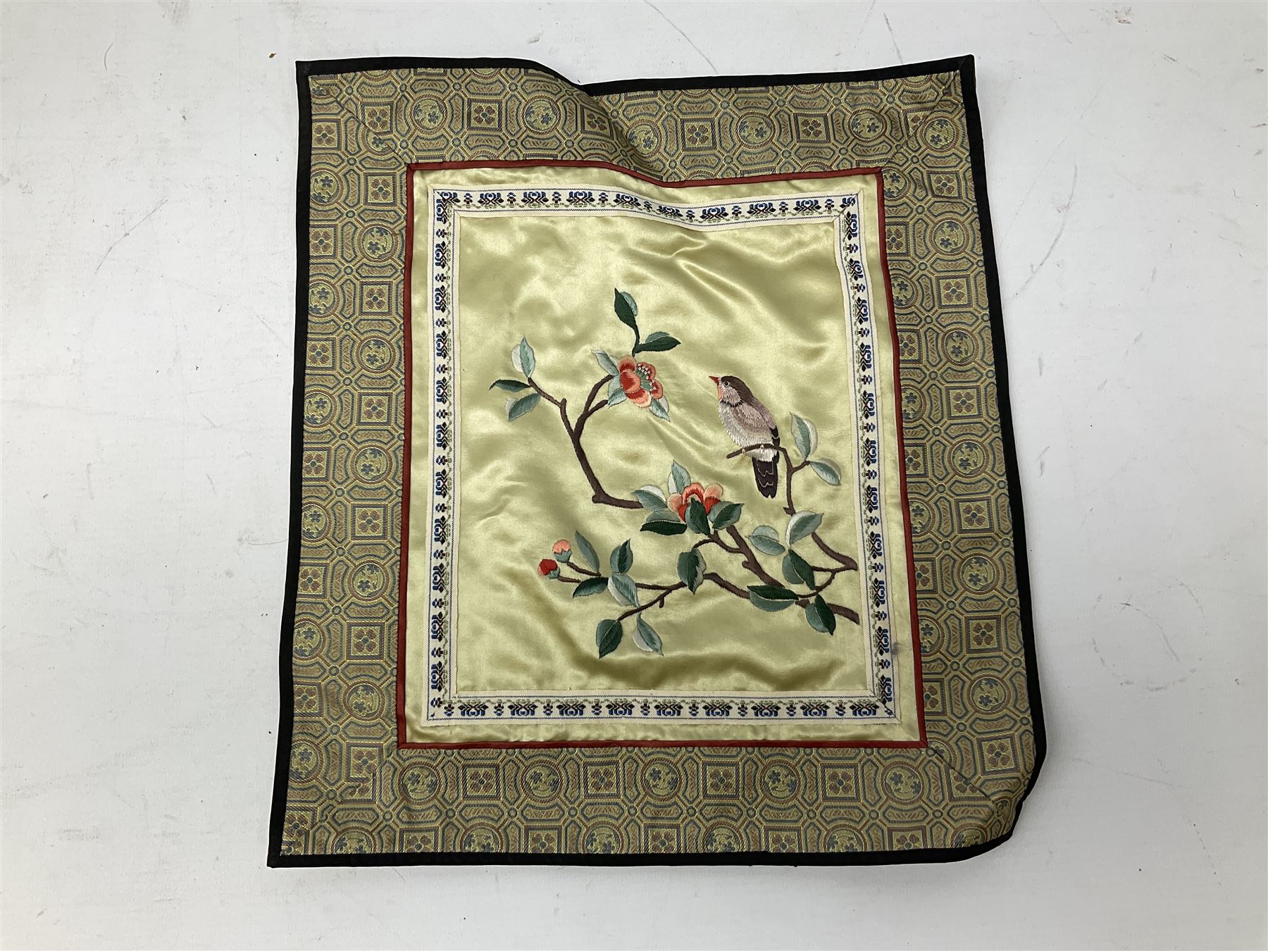 Six Chinese silks on fabric panels embroidered with birds on blossoming branches, along with three other Chinese painted silks 