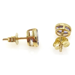 Pair of oval tanzanite gold stud ear-rings stamped 9K