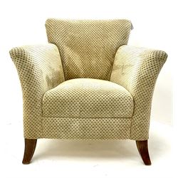 Bucket armchair, upholstered in patterned fabric, shaped supports 