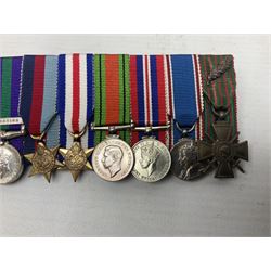 Captain (later Brigadier) Percy Howard Hansen V.C., D.S.O., M.C. 6th (Service) Battalion Lincolnshire Regiment - representative group of thirteen miniature dress medals comprising VC, DSO, MC, WW1 trio, GSM with Palestine clasp, four WW2 medals/stars, George VI Coronation Medal and French Croix-De-Guerre with MID leaves; all with ribbons on pinned bar for wearing; together with display of contemporary tunic ribbon bars for eight medals, framed with Lincolnshire Regiment cap badge, newspaper cutting and London Gazette extract; framed head and shoulder portrait of Hansen in uniform clearly showing his medal bars; and copies of related biographical information. Auctioneer's Note: Extract from the London Gazette 1st October 1915 regarding the VC 'For most conspicuous bravery on the 9th August 1915, at YILGHIN BURNU Gallipoli Peninsular. After the second capture of the 