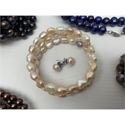 Collection of coloured pearl jewellery including earrings, necklaces, bracelets and pendants 