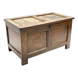 18th century oak blanket box, panelled hinged lid, back, sides and front, on stile supports