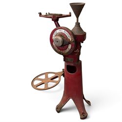 Two early 20th century dairy equipment items: Waide & Sons, Leeds – oak barrel butter churn with iron bands, later converted to electric operation, on trestle stand (W71cm H115cm); Lister – ‘Ball Bearing’ cast iron cream separator, with hopper and foot pedal, in red-painted finish (W47cm H49cm)
