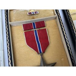 American Purple Heart Medal awarded to 32634848 Charles H. Poppo; cased with identity tags and paperwork; and Bronze Star Medal awarded to U.S. Marine Esteban T. Maranao; cased; American WWII Victory Medal and Asiatic Pacific Campaign Medal