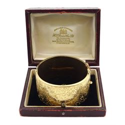 9ct gold wide hinged bangle, with bright cut foliate decoration, by Smith & Pepper Ltd, Birmingham 1963, boxed