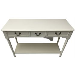 Laura Ashley - 'Clifton' ivory finish three drawer console table, fitted with three frieze drawers with heavily moulded edges, raised on turned supports united by undertier
