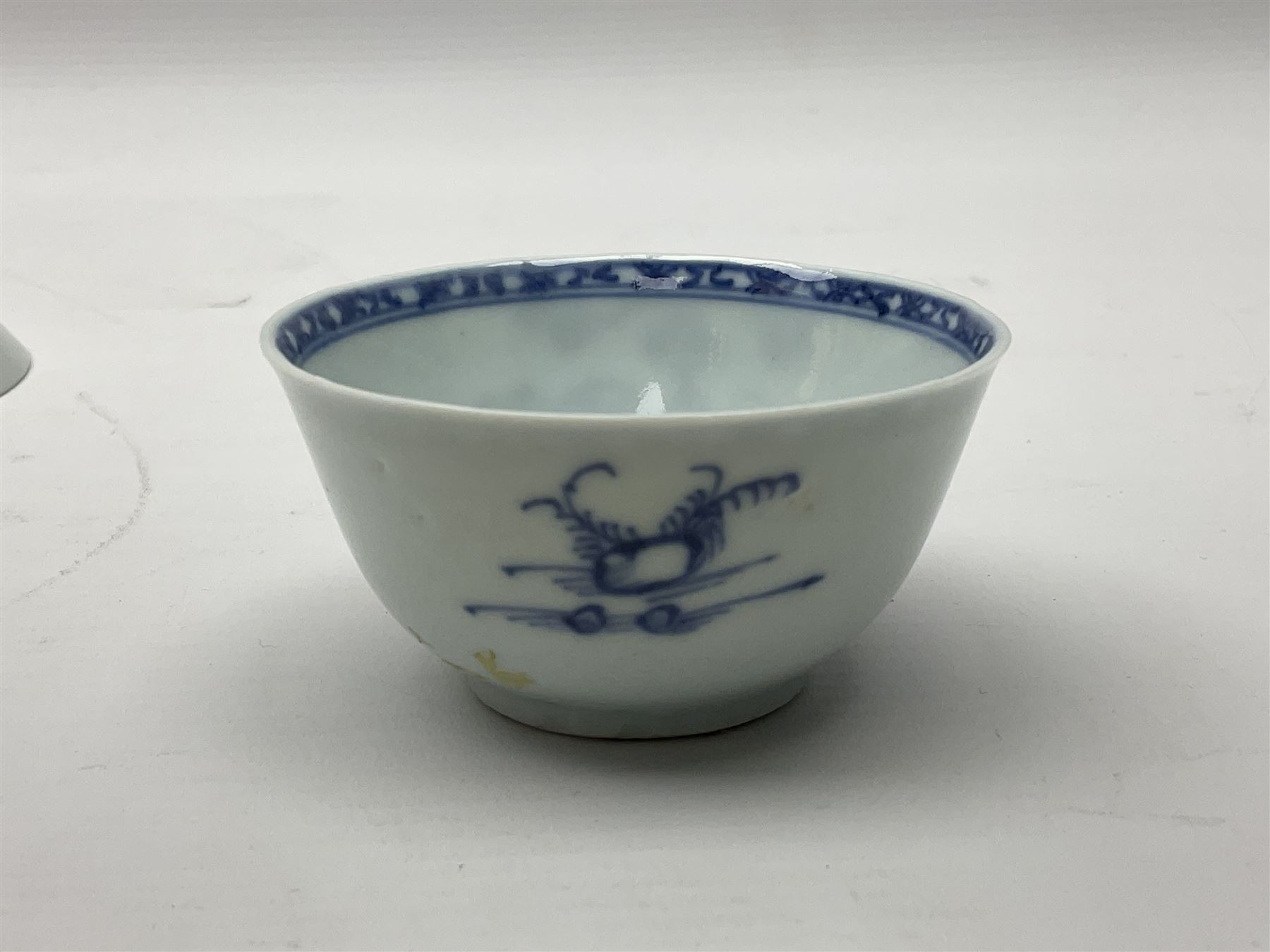 Chinese Nanking Cargo tea bowl and saucer, each decorated with pin tree, saucer with Christie's lot label beneath, tea bowl D7.5cm, saucer D11.5cm