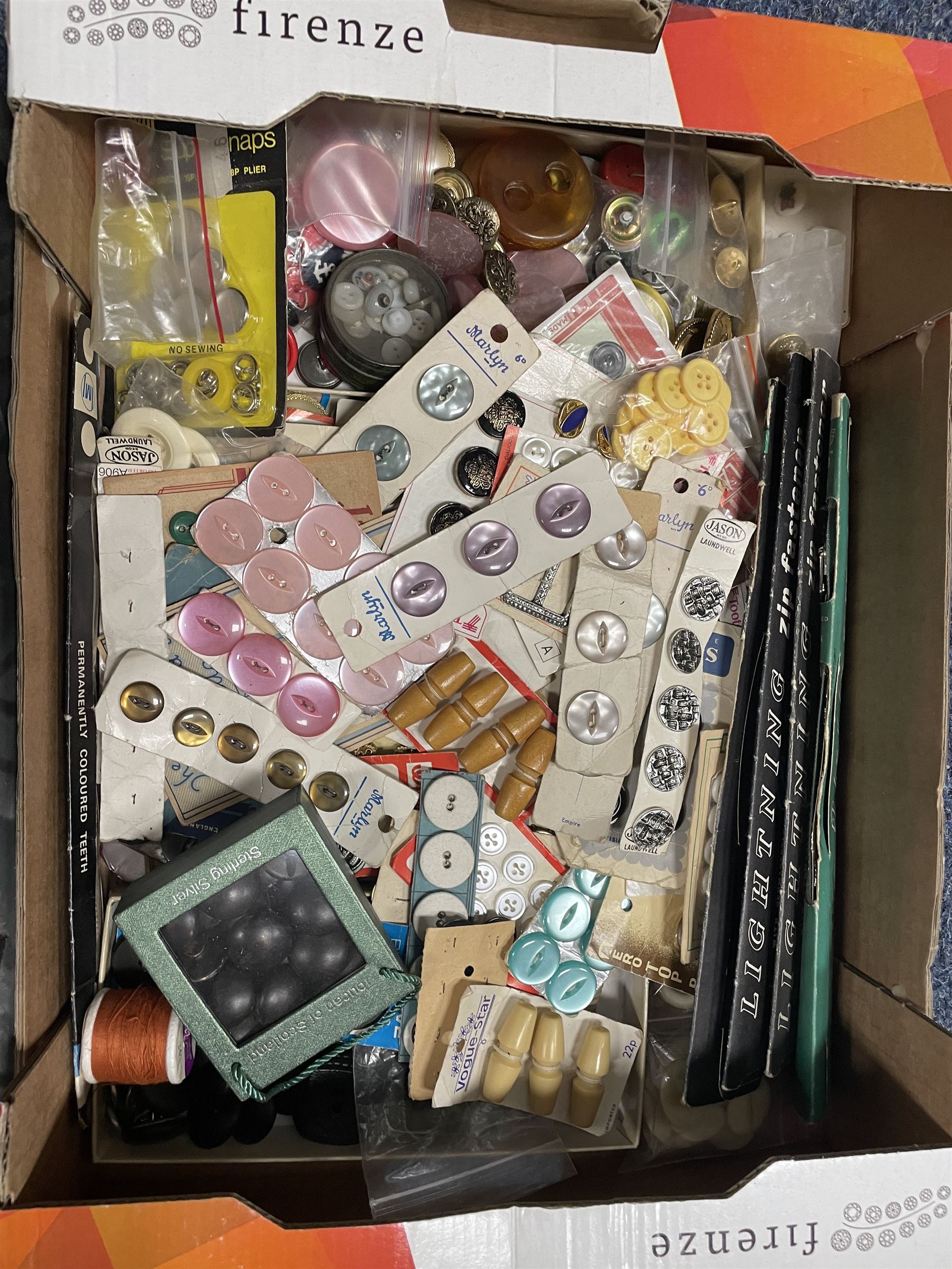 Quantity of sewing accessories to include buttons, cotton reels, Empisal Knitmaster wool winder, scissors, pins, sewing needles and other sewing aids in three boxes