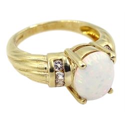 9ct gold single stone opal ring with white topaz set shoulders, hallmarked 