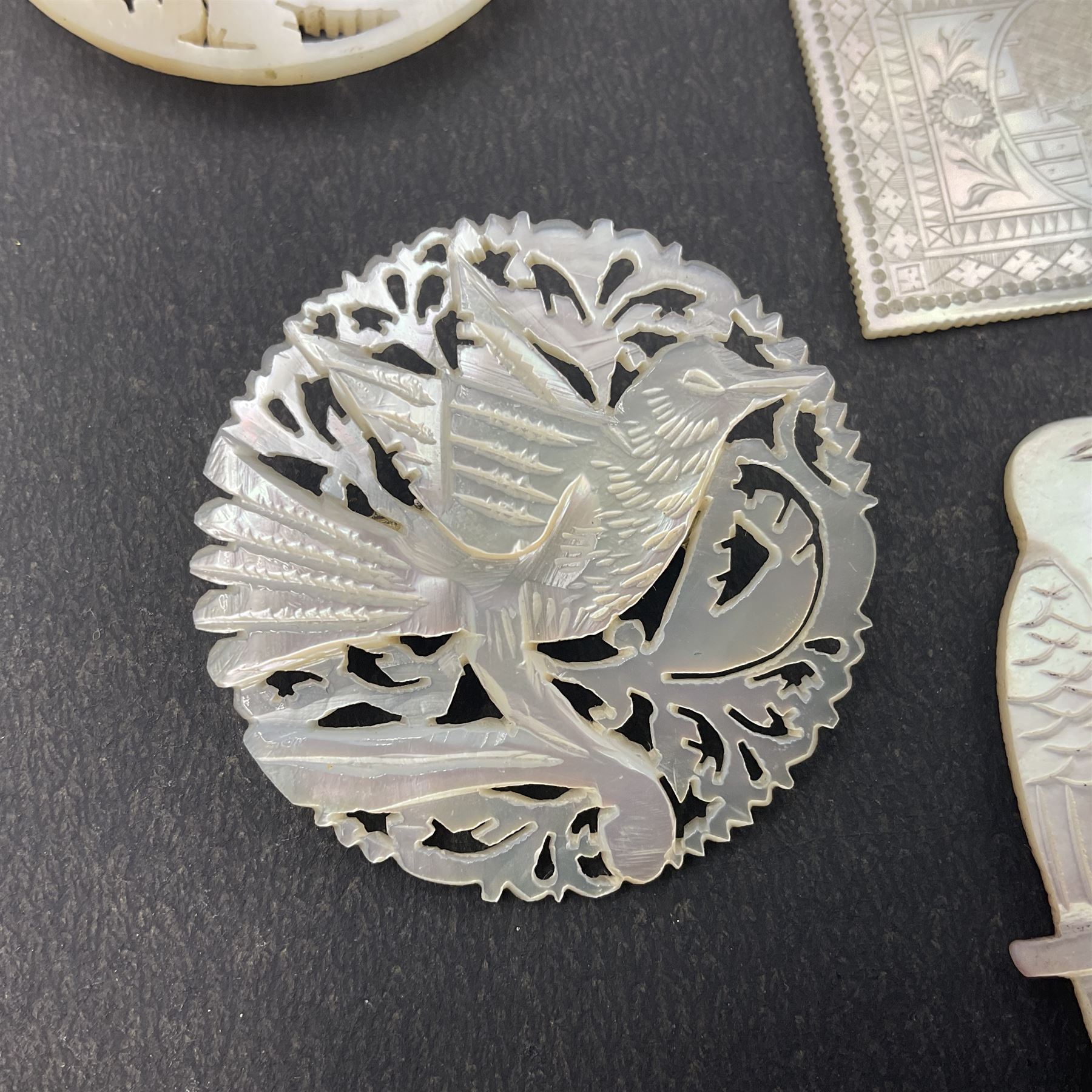 Two silver fruit knives with mother of pearl handles, hallmarked, mother of pearl tokens and similar items 