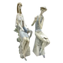 Two Lladro figures, comprising Girl with Pheasant no 1055 and Flute Player no 1025, both with original boxes, largest example H40cm 