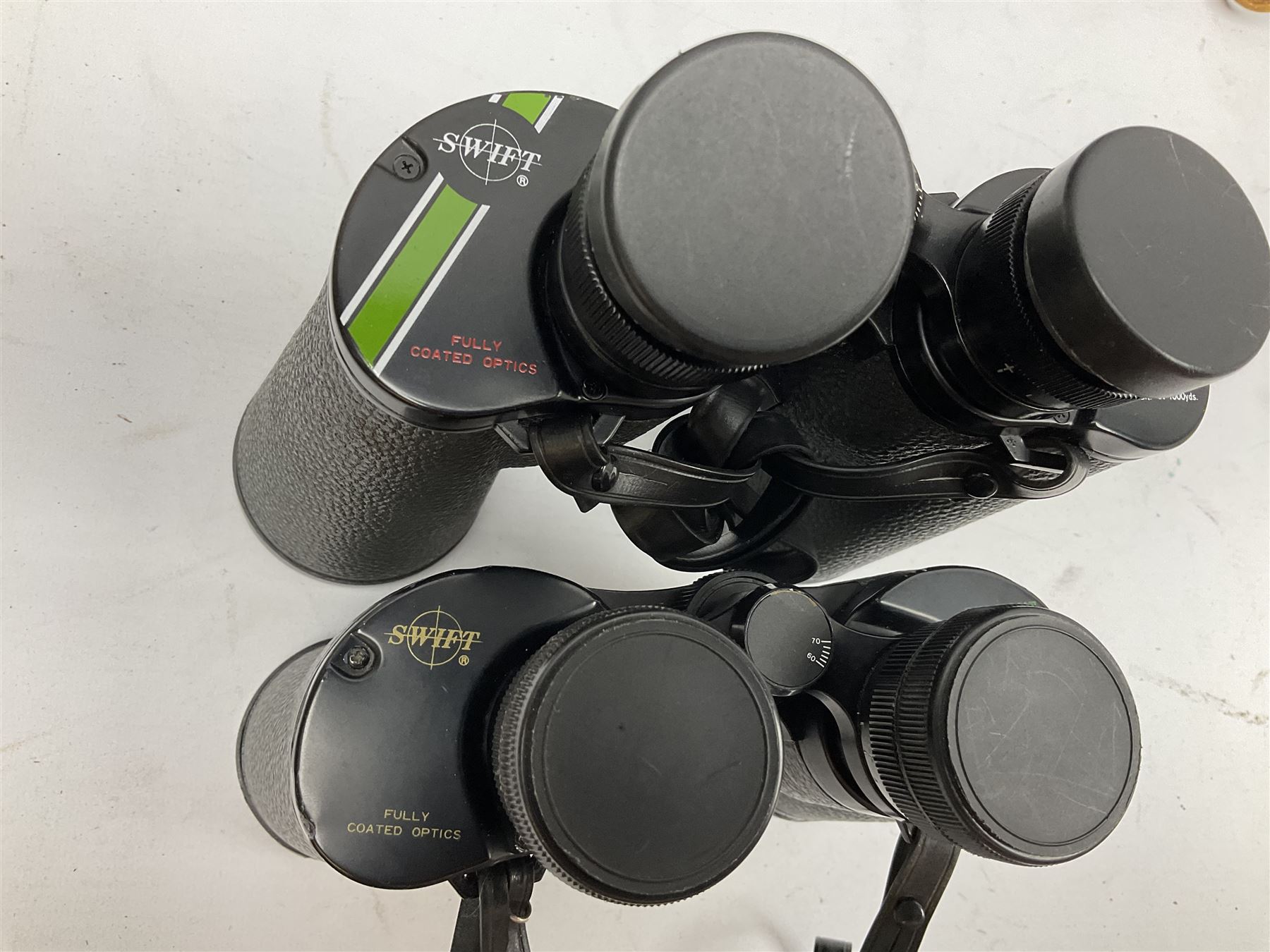 Eleven pairs of Swift binoculars, to include Greens 8x40, Saratoga 8x40, two pairs of Newport Mk II 10x50, Newport 10x50, Saratoga Mk II 8x40, Audubon 8.5x44, etc, 
