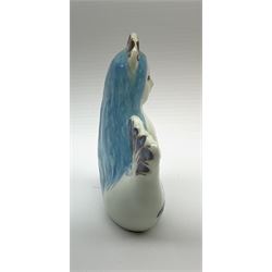 A Doreen Middelboe for Royal Copenhagen Aluminia figure, modelled as a mermaid, with printed and painted marks beneath, H10.5cm.