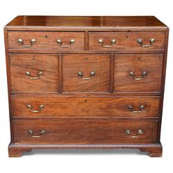 Georgian mahogany seven-drawer chest, the rectangular top above an arrangement of two long...