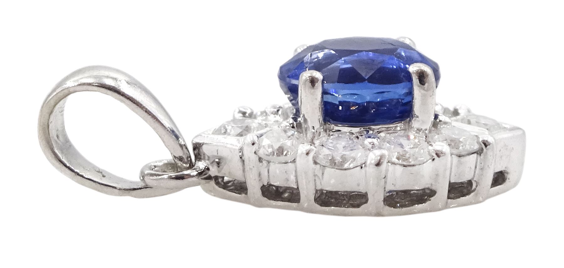 18ct white gold oval Ceylon sapphire and round brilliant cut diamond pendant, hallmarked, sapphire approx 0.60 carat