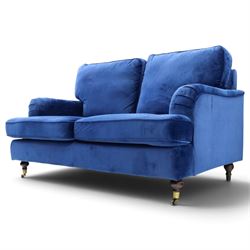 Howard design - two-seat sofa upholstered in blue fabric, traditional shape with rolled arms, on walnut finish turned feet with brushed metal cups and castors