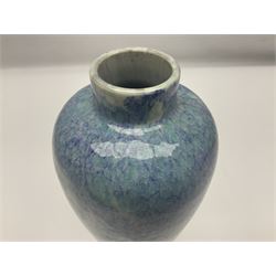 Holyrood Pottery vase of bulbous form decorated in a mottled and streaked green and blue glaze, with printed mark beneath, H24cm