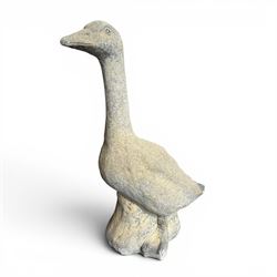Large cast stone garden statue modelled as a standing goose on a naturalistic base