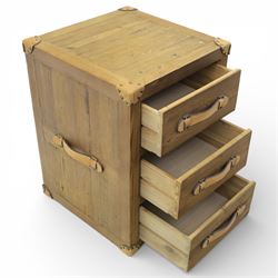 Contemporary leather trunk with handles and bedside table of similar design, three drawers with leather strap handles and leather corners Trunk: H 45cm, D 40cm, W 61cm Bedside table: H 69cm, D 51cm, W 52cm