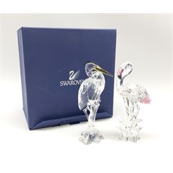 A Swarovski Crystal Heron h15cm high, together with a Swarovski Crystal flamingo h15.5cm,  in original box