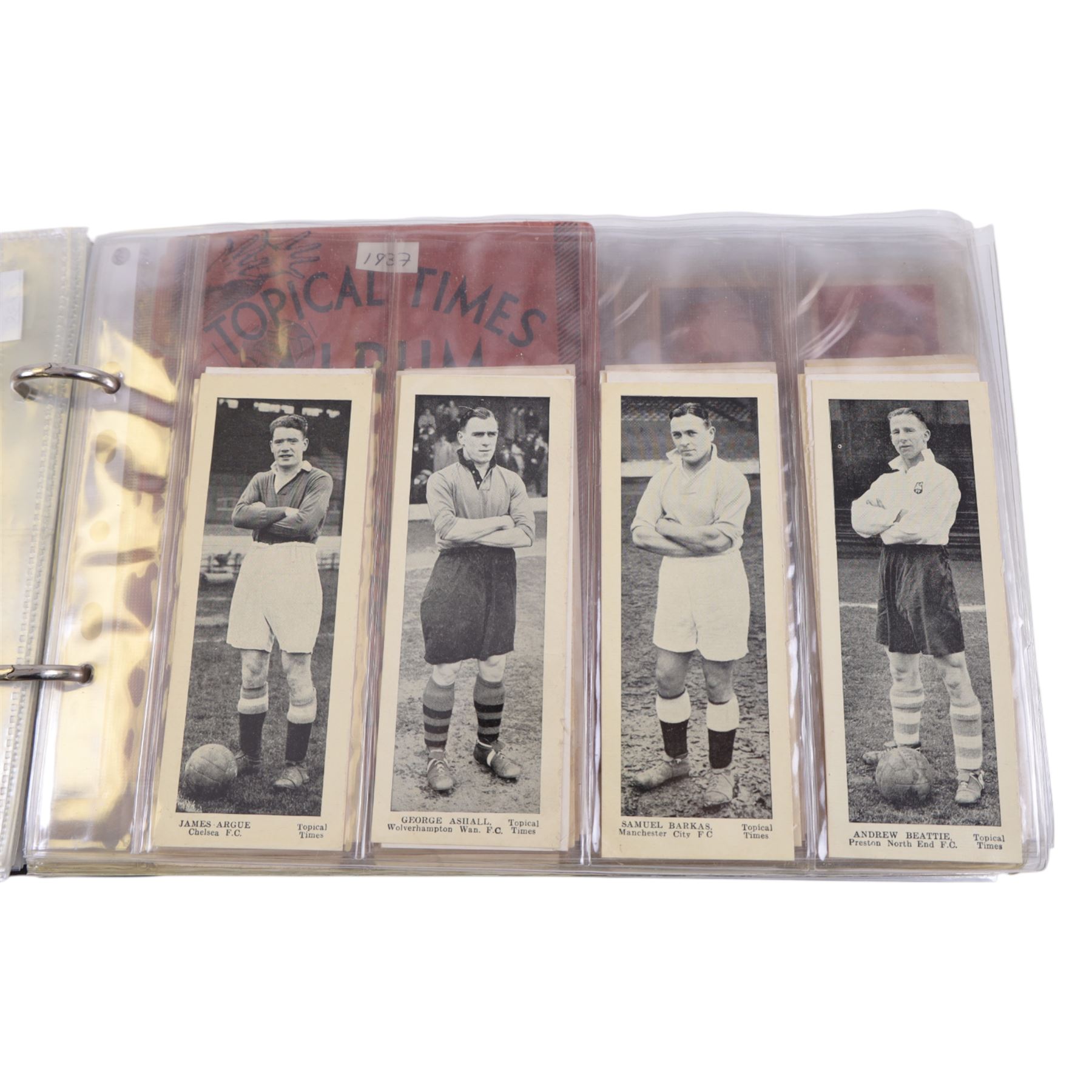Collection of 1930s and later Football related trading and cigarette cards, including complete set of sixteen 1936 Topical Times Panel Portraits of Star Footballers, collection of further 1930s Footballer Panel Portraits, complete set of twenty-five 1955 The Wizard Famous Footballer cards, complete set of fifty Wills Association Footballers 1935, complete set of fifty Godfrey Phillips International Caps cards, etc, housed in three albums