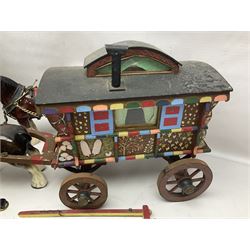 Two ceramic shire horse and gypsy caravans, together with horse brasses 