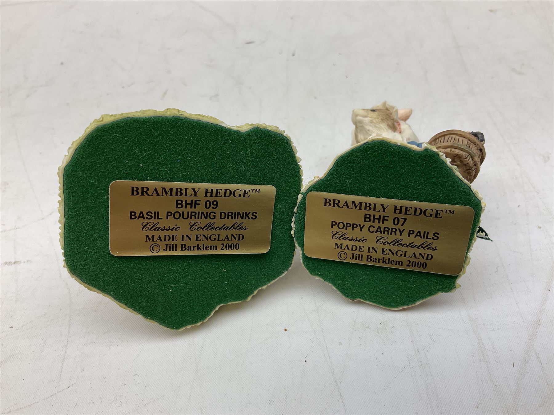 Four Classic Collectables Brambly Hedge figures, comprising Basil Pouring Drinks, Wilfred and Teasel Pushing Cart, Poppy Carry Pails and Mrs Apple, Wilfred and Basket, all boxed