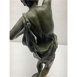 After Ernest Rancoulet, bronzed figure modelled as a man playing the tambourine, upon a stepped circular base, H37cm 