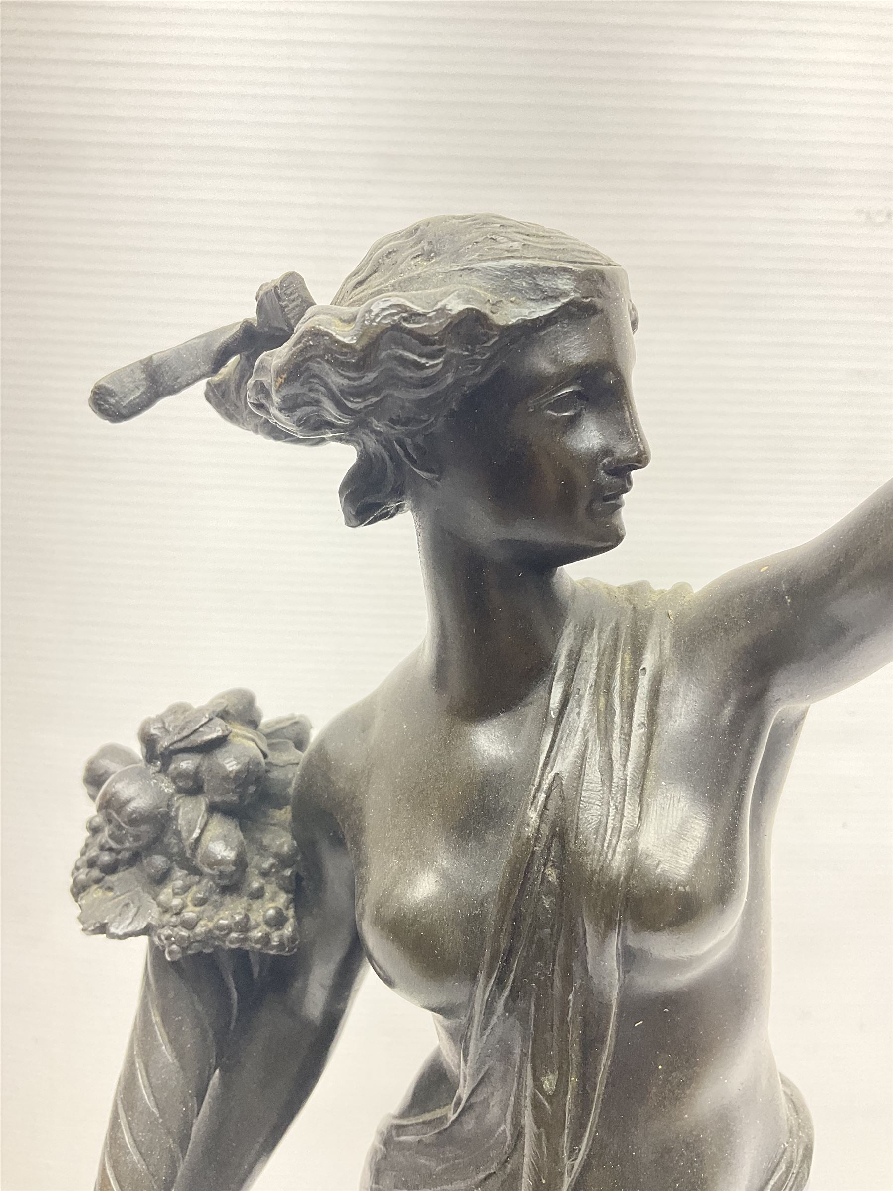 After Louis Guillaume Fulconis, a bronzed figure of Fortuna with cornucopia in her right hand and standing on a wheel on green serpentine base, height 60cm