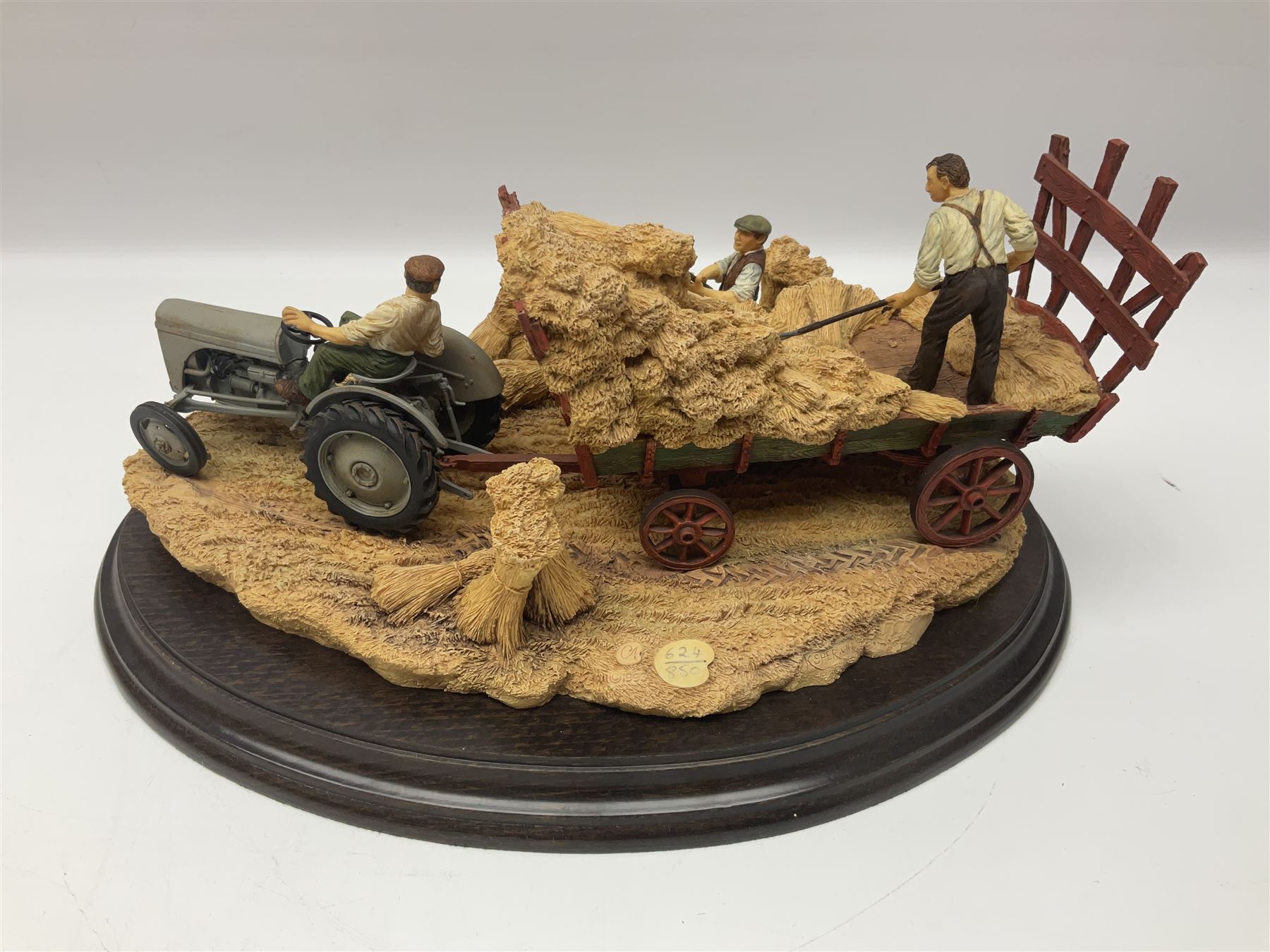 Two Country Artists figures, After the storm no CA831, limited edition 891/1750 and The Harvesters, limited edition 824/850, both with wooden base and certificates of authenticity