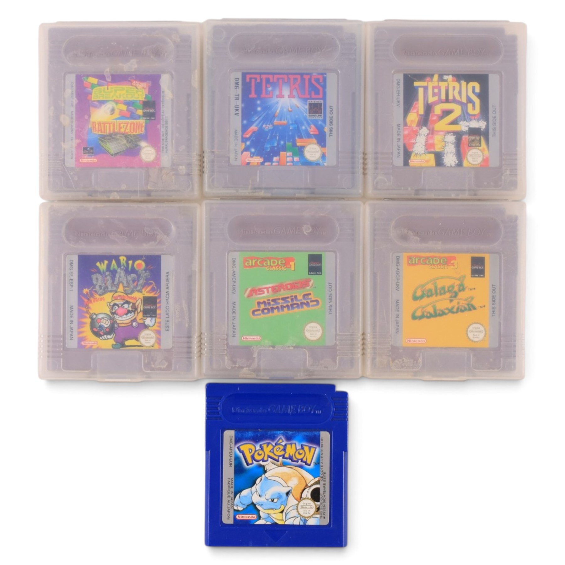 Nintendo Gameboy handheld game console in black, boxed, with seven games comprising Pokemon Blue, Arcade Classic 3: Galaga and Galaxian, Tetris, Tetris 2, Wario Blast, Arcade Classics Super Breakout Battlezone and Arcade Classics 1 Asteroids and Missile Command, all unboxed