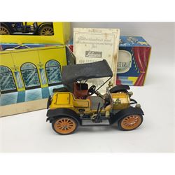 Schuco - four boxed Old Timer series tin-plate model cars comprising two 1228 Opel Doktor-Wagen 1909, one in yellow and another in blue, 1229 Mercedes Simplex anno 1902, and 1230 Renault 6CV/1911 Voiturette 