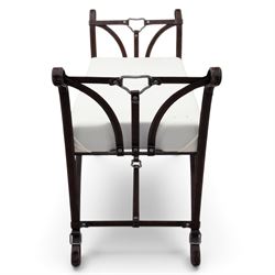And So To Bed - 'Handel' wrought iron window seat, the rectangular upholstered seat enclosed by scrolling and arched ends with shaped uprights, on scrolling supports united by curved stretchers