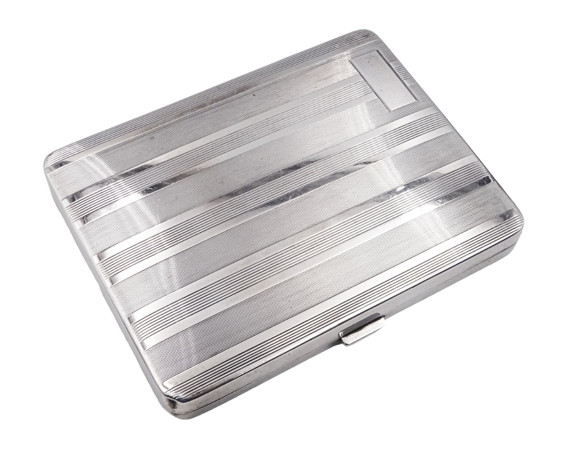 1920's silver cigarette case with engine turned horizontal striped decoration and vacant panel to top corner, hallmarked Adie Brothers Ltd, Birmingham 1929, H10.7cm, W8.2cm, approximate total weight 5.39 ozt (167.7 grams)