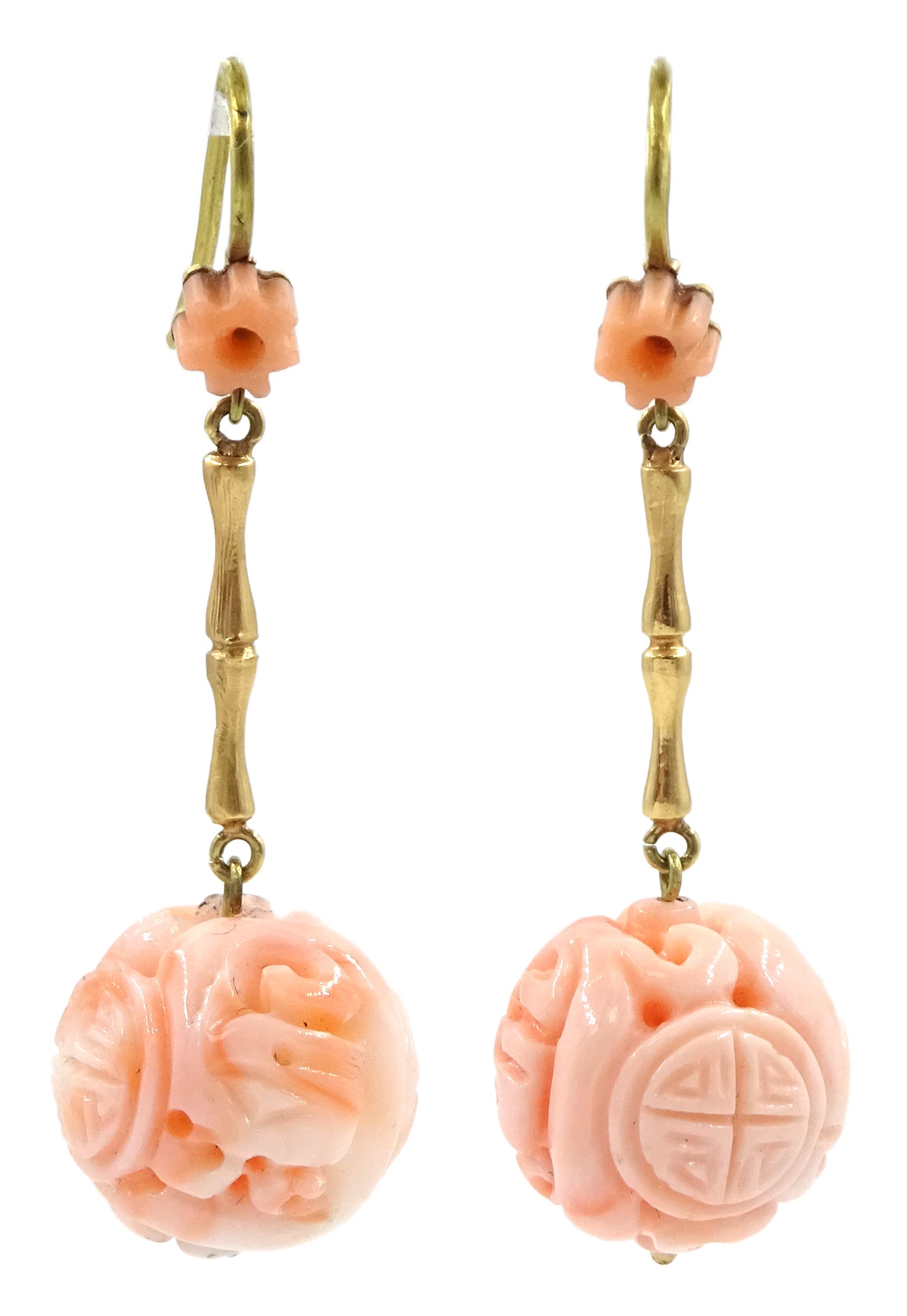 Pair of 18ct gold carved coral pendant earrings