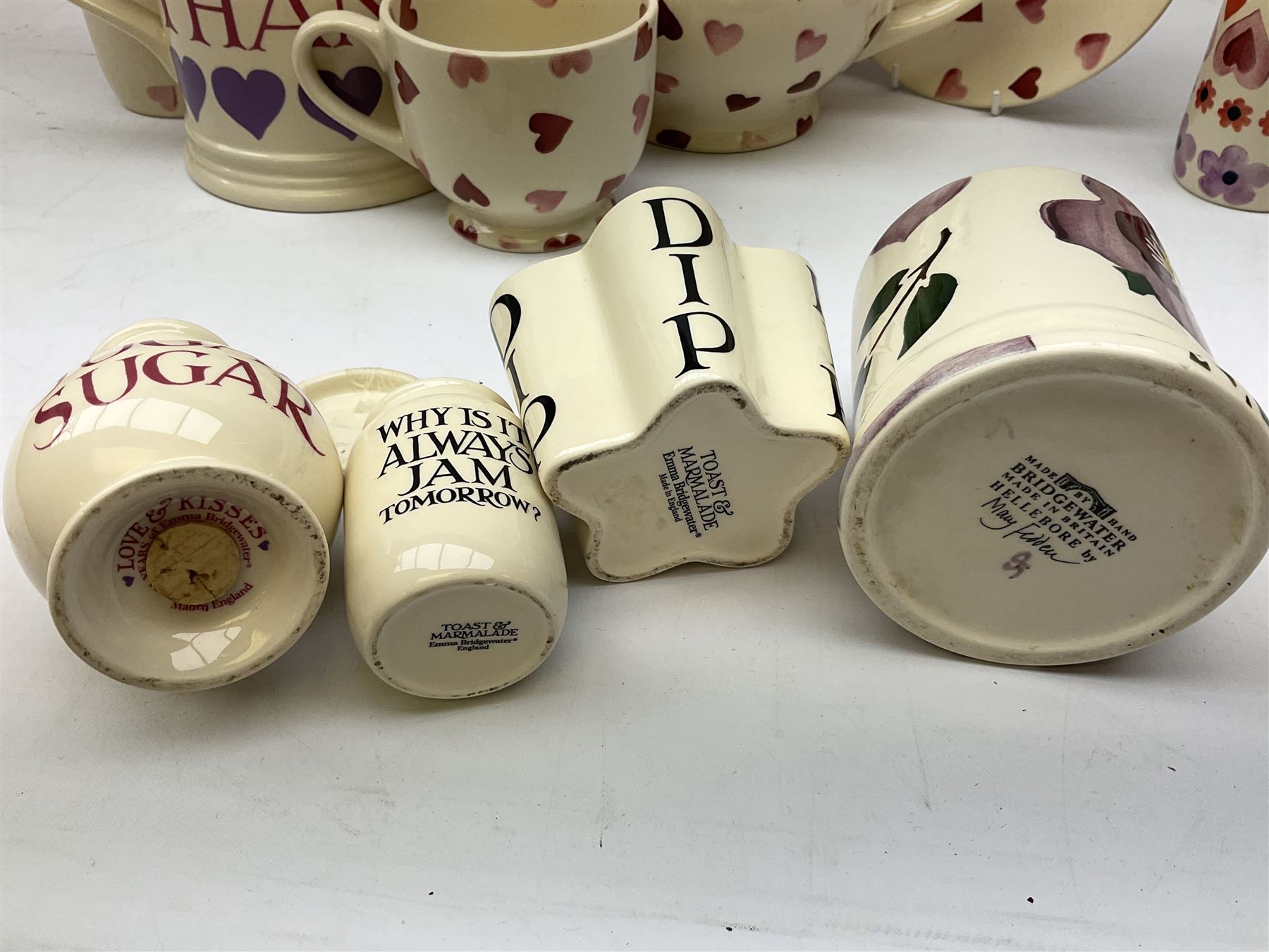 Collection of Emma Bridgewater spongeware ceramics, to include Pink Hearts pattern teapot, milk bottle vase, teacup and saucers, Love & Kisses sugar shaker and large 'I love you more than Marlon Brando' mug, British Birds and Black and White pattern mugs, etc, all with printed marks beneath, tallest H21.5cm