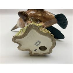 Karl Ens figure of a green woodpecker, modelled perched upon branch, model no. 7527, together with Karl Ens figure of budgie and Beswick Kingfisher no. 2371, all with printed marks beneath, tallest H25cm