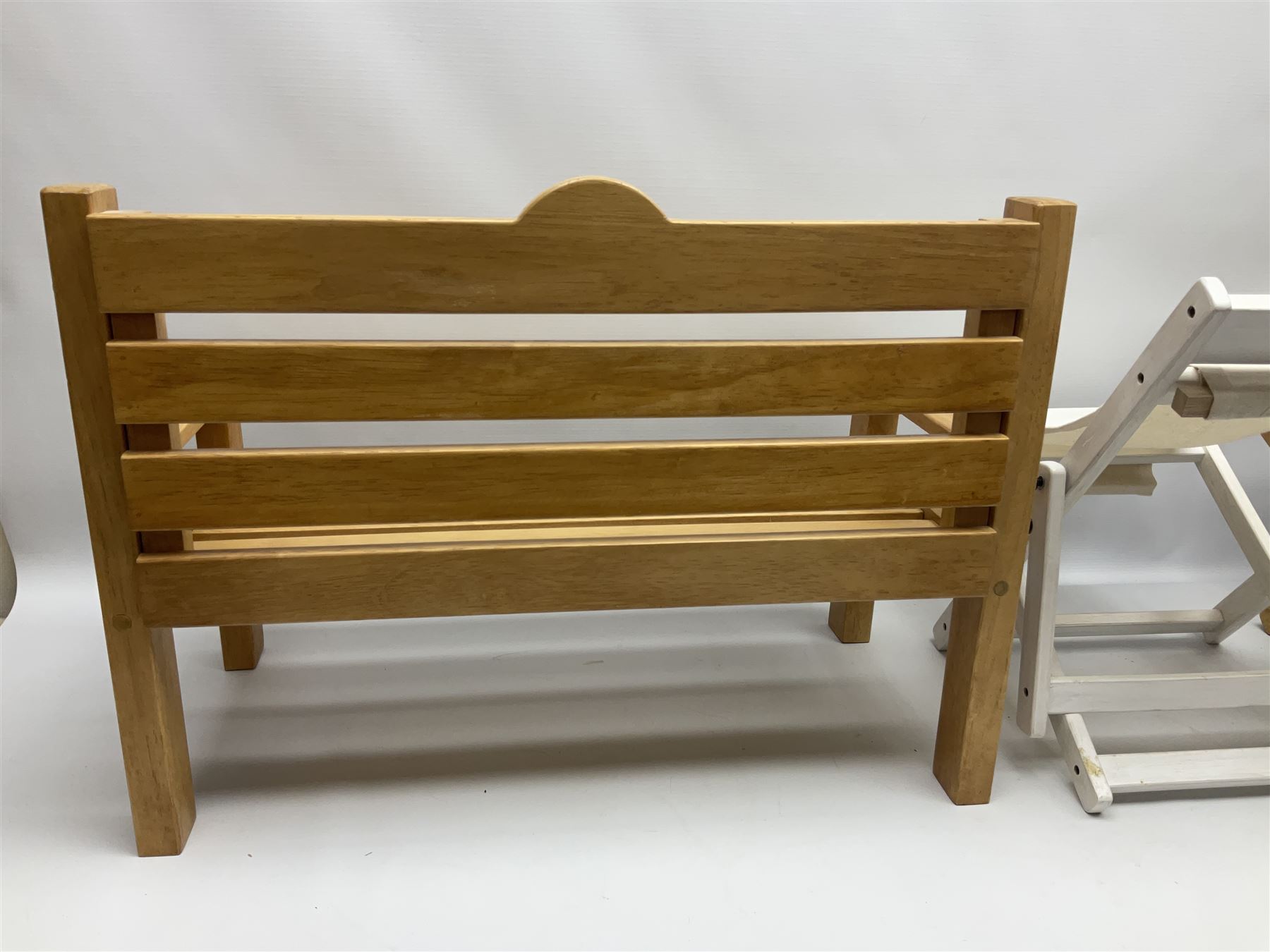 Charlie Bears bench, H41.5cm L58.5cm D29.5cm, and two Charlie Bears deck chairs, each approximately H37cm, together with a limited edition Silver Tag Bear, Logan Bear, 226/1,500, with tag, and two further bears, (6)