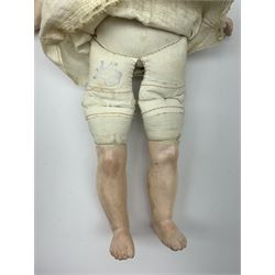 Early 20th century Cuno and Otto Dressel wax shoulder head doll with applied hair and fixed glass eyes, soft body with jointed composition lower limbs, maker's stamp to right thigh, clothing and box H38cm in original box