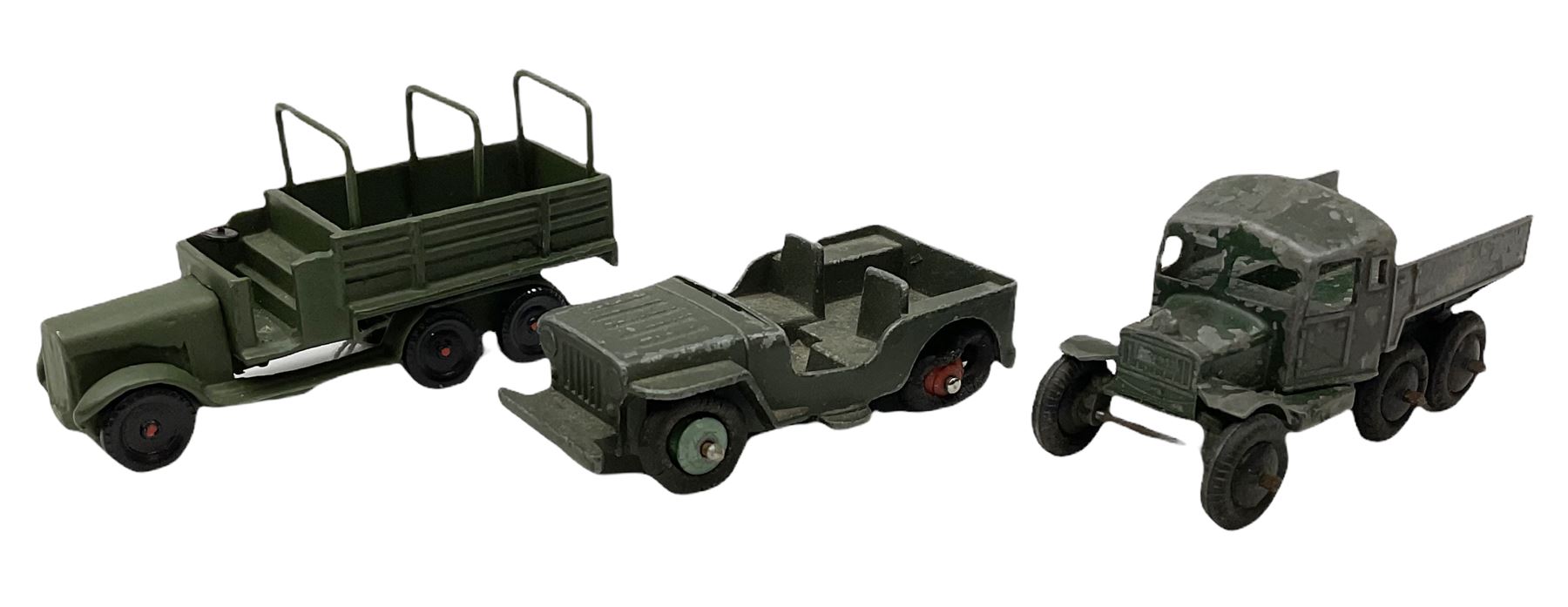 Various Makers - military vehicles comprising Schuco Kubelwagen and two Russian tanks, all boxed; and quantity of unboxed and playworn models including five Crescent Field Guns and Ammunition Limbers, Crescent Heavy Rescue Crane, Johilco Mobile Searchlight, Britains German Army BMW Combination, two Skybirds trucks etc; and a tin-plate armoured car.