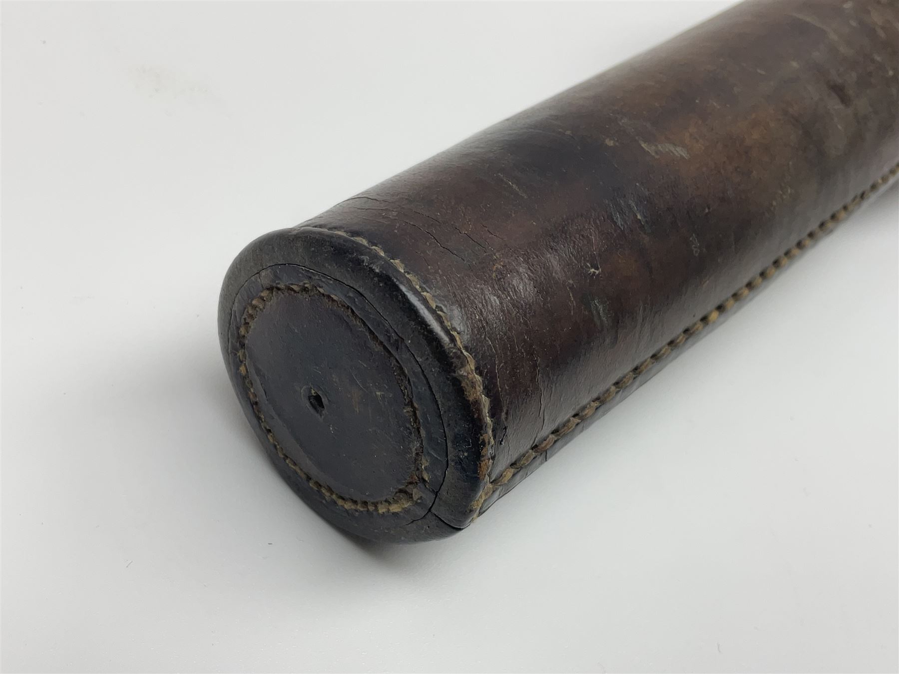 19th century telescopic hunting horn, the bell engraved 'The Beaufort', with makers mark Kohler & Son, makers, 61 Victoria Street, Westminster (from Covent garden) London, in a leather sheath, horn full extended L91cm 