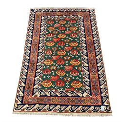 Turkish rug, decorated with stylised plant and floral motifs