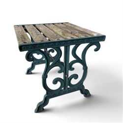 Small cast iron and wood slatted garden table