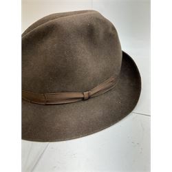 Akubra pure fur felt trilby hat, together with another trilby and two top hats, one by Woodrow and one by Dunn & Co