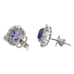 Pair of 18ct white gold oval sapphire, round and tapered baguette diamond stud earrings, total sapphire weight approx 4.50 carat, total diamond weight approx 1.90 carat