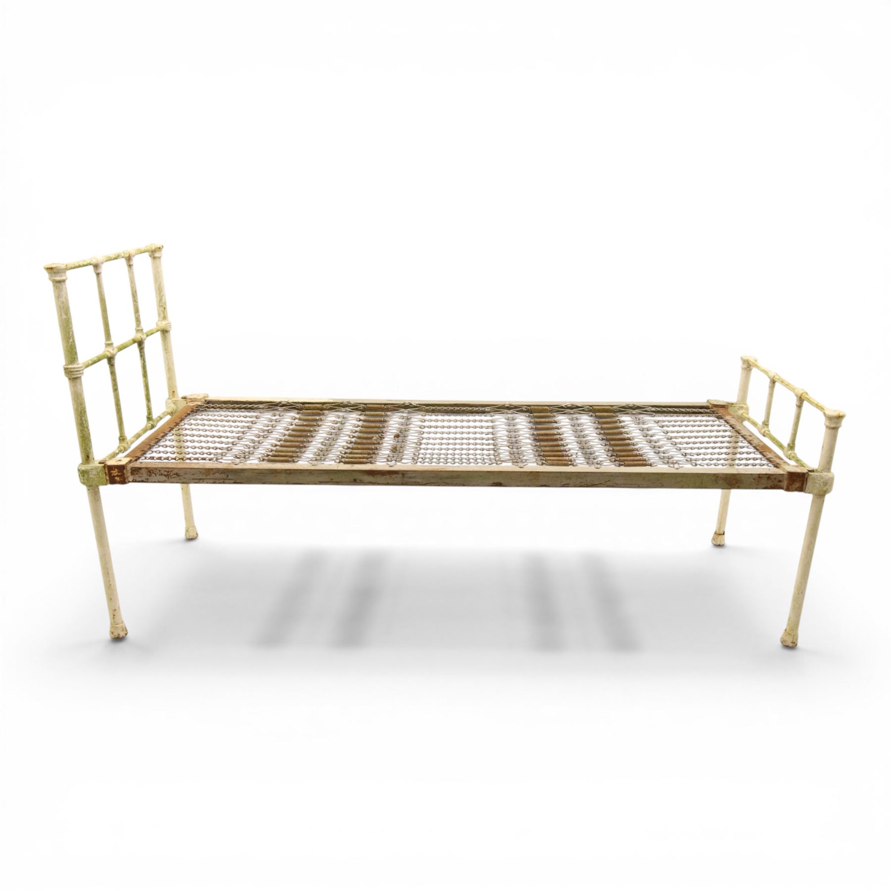 19th century wrought iron single bed, white frame with knot details, frame with wire and spring supports